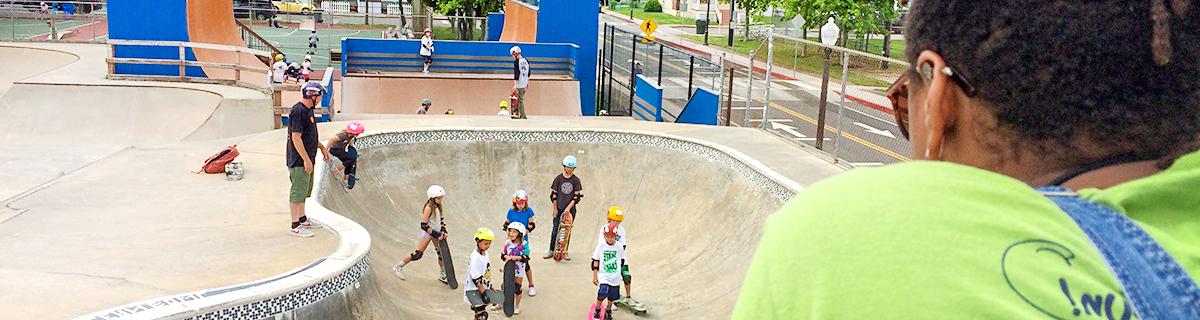 elementary age children use the skating park